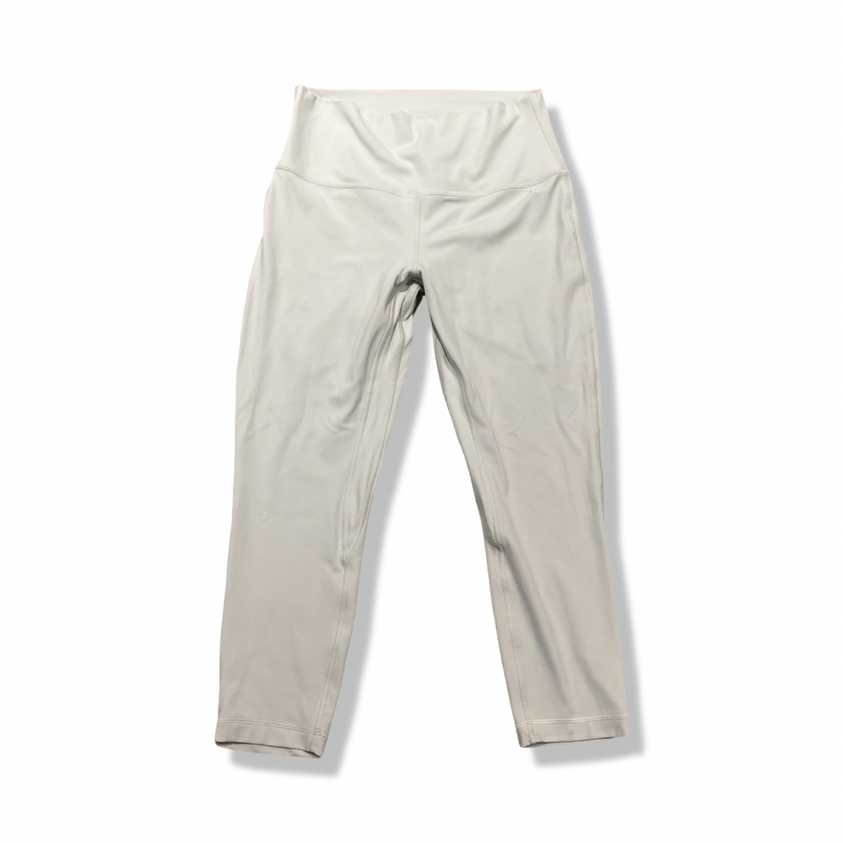 Vita träningstights från Lululemon för dam, fotograferade framifrån mot en vit bakgrund.