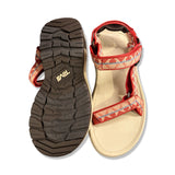 Teva Hurricane XL T3 sandaler för dam i beige och rött, sedda uppifrån och underifrån mot en vit bakgrund.