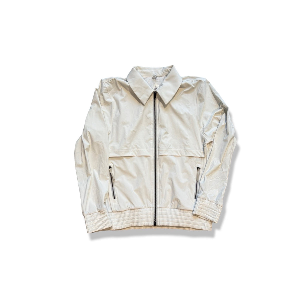 Off-white Lululemon unisex träningsjacka med dragkedja och krage, fotograferad framifrån mot vit bakgrund.