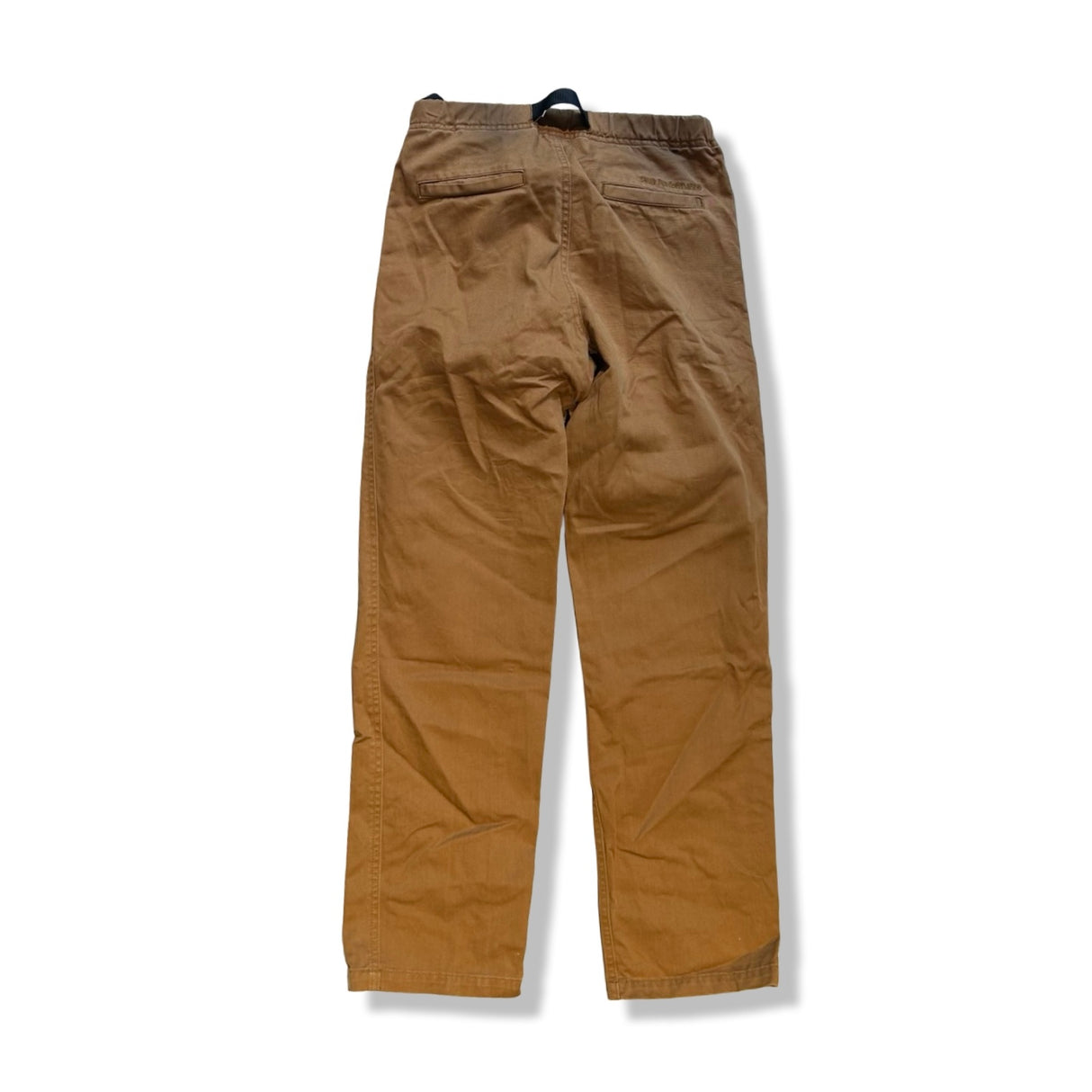 Bruna Peak Performance Heavy Cotton-byxor för dam visade bakifrån mot en vit bakgrund.