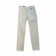 Beige funktionsbyxor från Peak Performance för dam, fotograferade framifrån mot en vit bakgrund.
