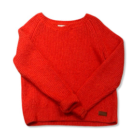 Rosa sweatshirt från Peak Performance för dam i stickat material, fotograferad framifrån mot en vit bakgrund.