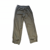 Beige Fjällräven Ruska unisex regnbyxor med resårmidja och kardborrejustering, sedda framifrån mot en vit bakgrund.