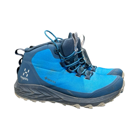 Blå Haglöfs LIM FH GTX Mid vandringskängor för herr med GORE-TEX, fotograferade från sidan mot vit bakgrund.